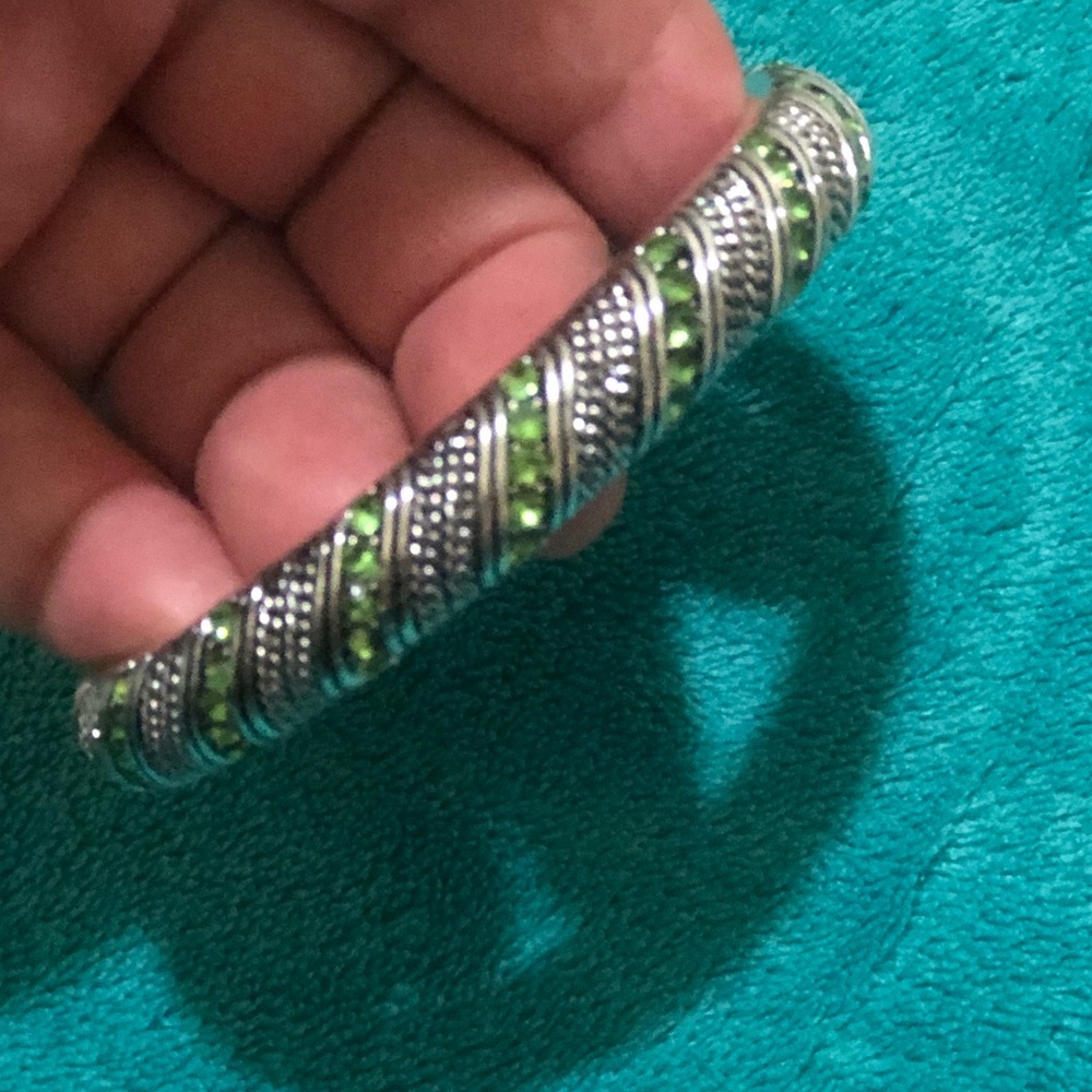 Avon New Bangels in silver tone and green